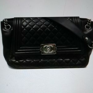 Black chanel bag it's unique and no longer sold